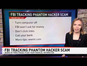 TV newscaster in front of screen