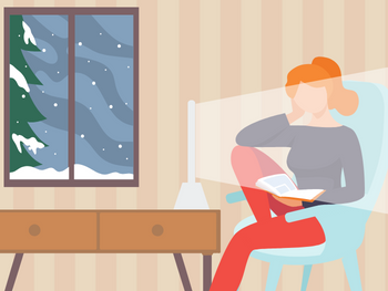 illustration of woman reading next to light therapy lamp