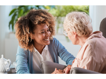 caregiver smiles at client