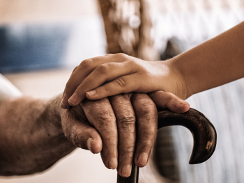 young hands holding older hands