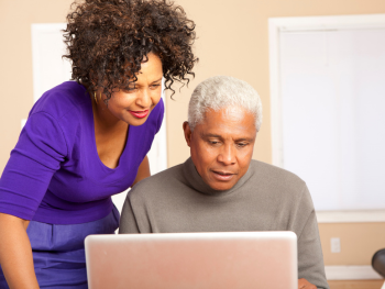 couple looking at a laptop