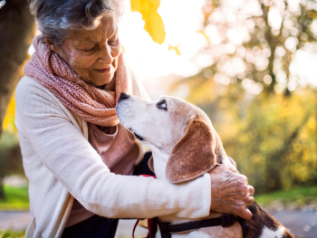 woman and dog gaze at eachother