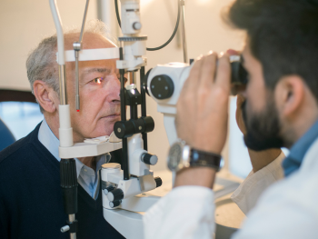 older man has an eye exam