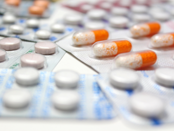 an array of pills in blister packs
