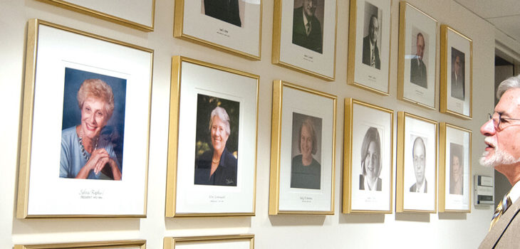 David Gamse viewing portraits of previous JCA presidents