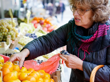 woman choosing produce