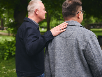 two older men viewed from the back